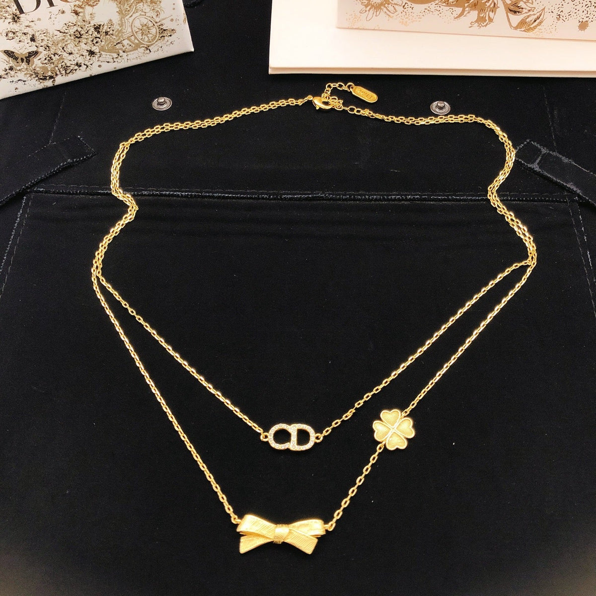 Martin Graham pendant necklace in polished metal-tone – close-up detail