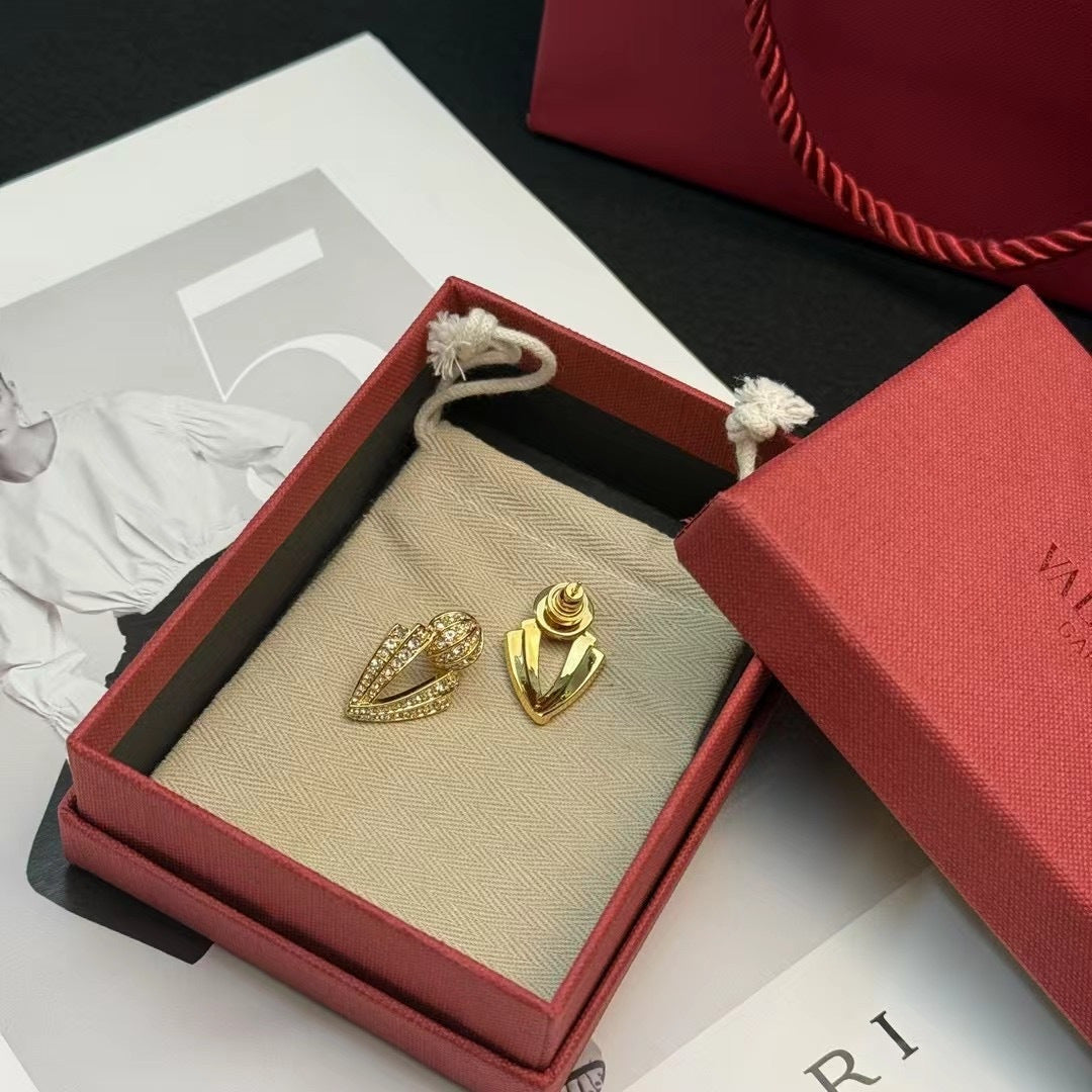 Martin Graham stud earrings in polished metal-tone