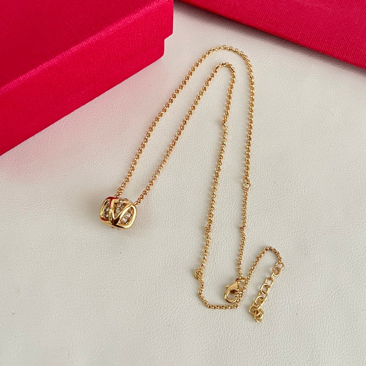 Martin Graham pendant necklace in polished metal-tone