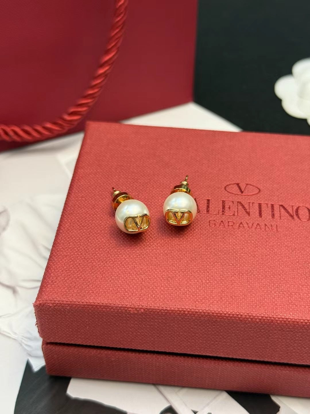 Martin Graham stud earrings in polished metal-tone