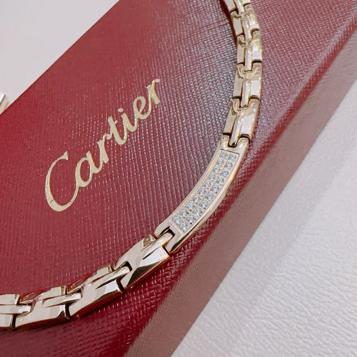 Martin Graham pendant necklace in polished metal-tone – close-up detail