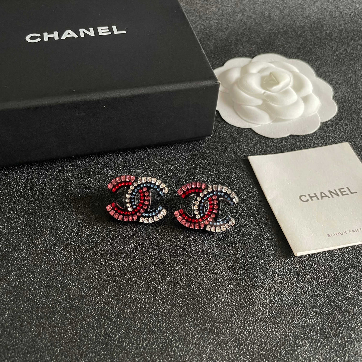 Martin Graham stud earrings in polished metal-tone – styled product view
