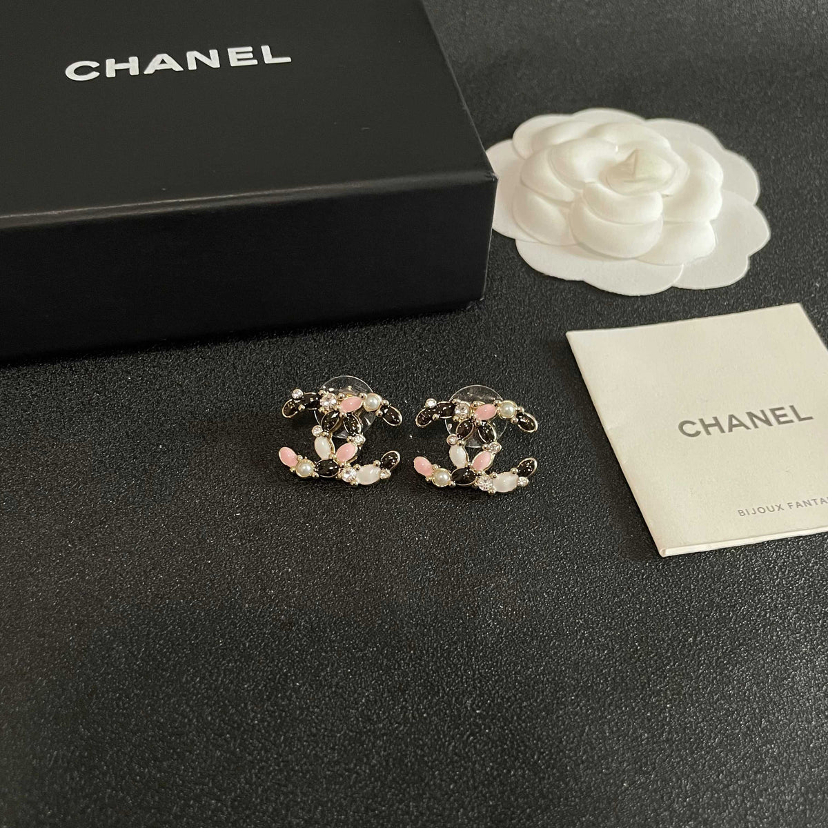 Martin Graham stud earrings in polished metal-tone – styled product view