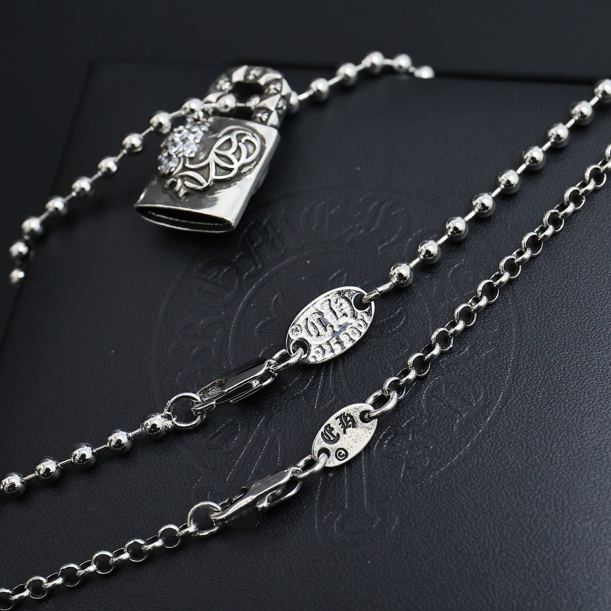Martin Graham pendant necklace in polished metal-tone – styled product view