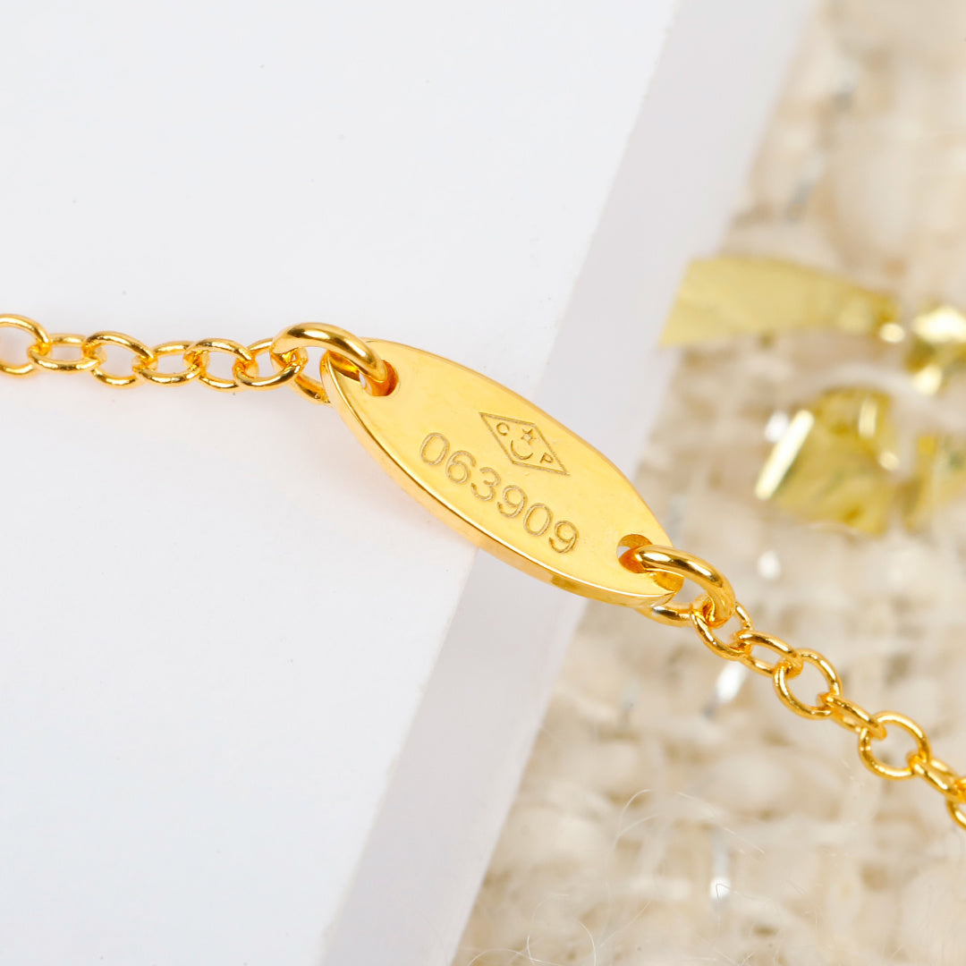 Martin Graham pendant necklace in polished metal-tone – close-up detail