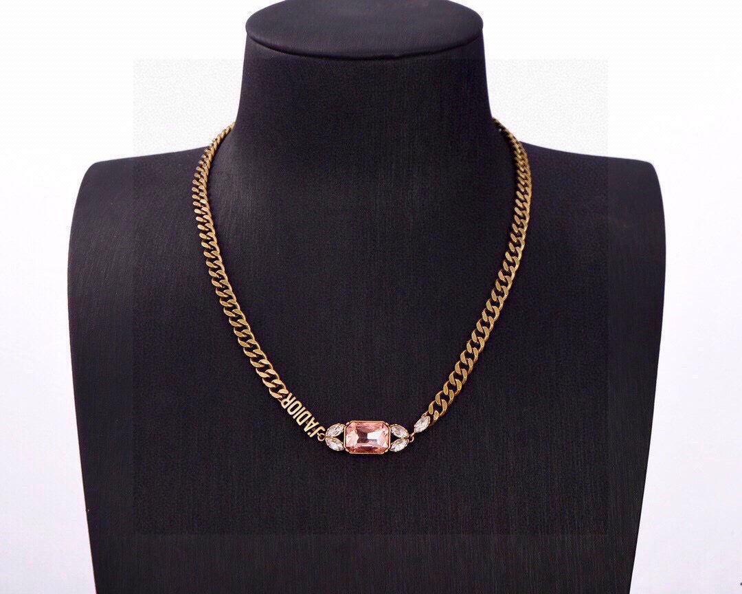 Martin Graham pendant necklace in polished metal-tone – close-up detail