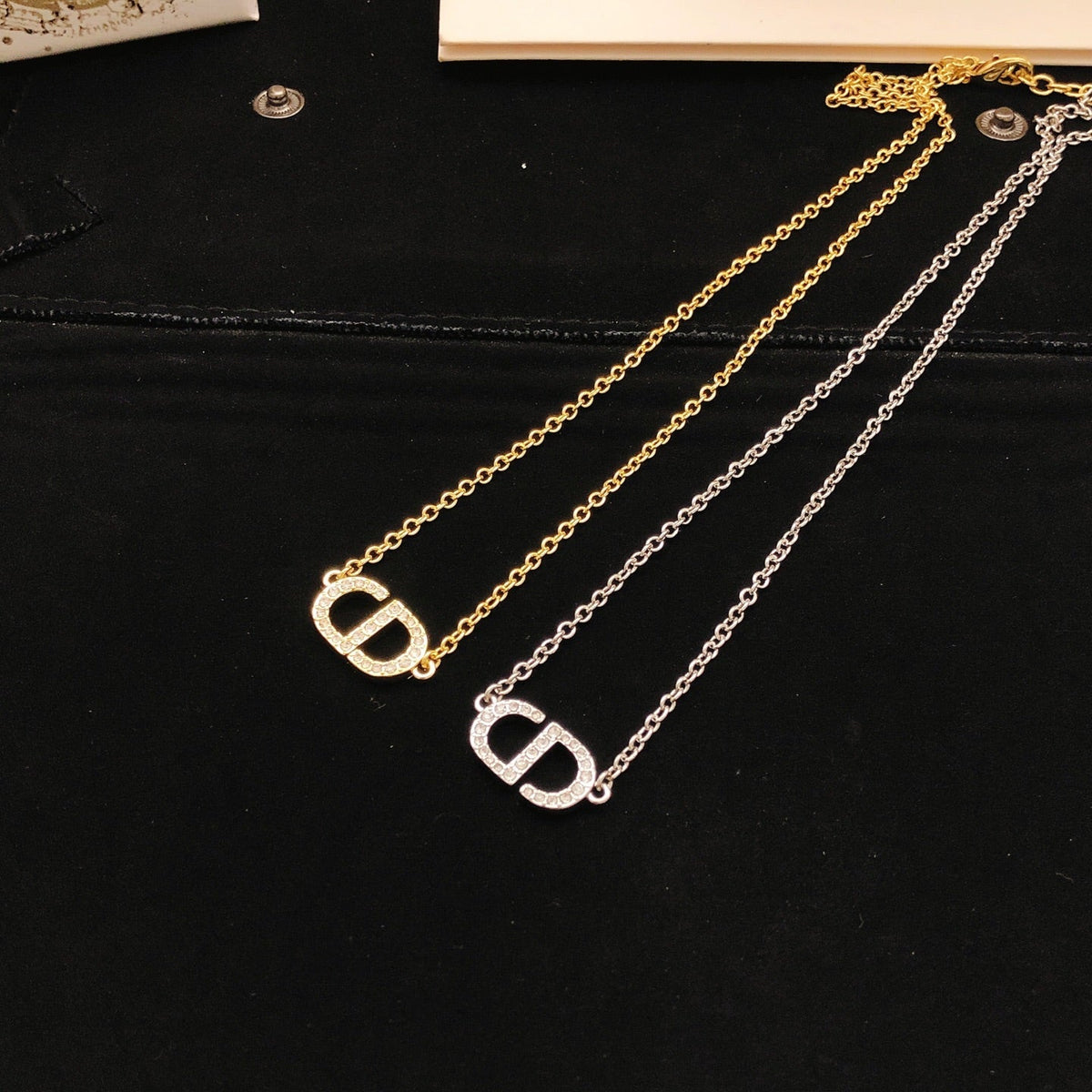 Martin Graham pendant necklace in polished metal-tone – close-up detail