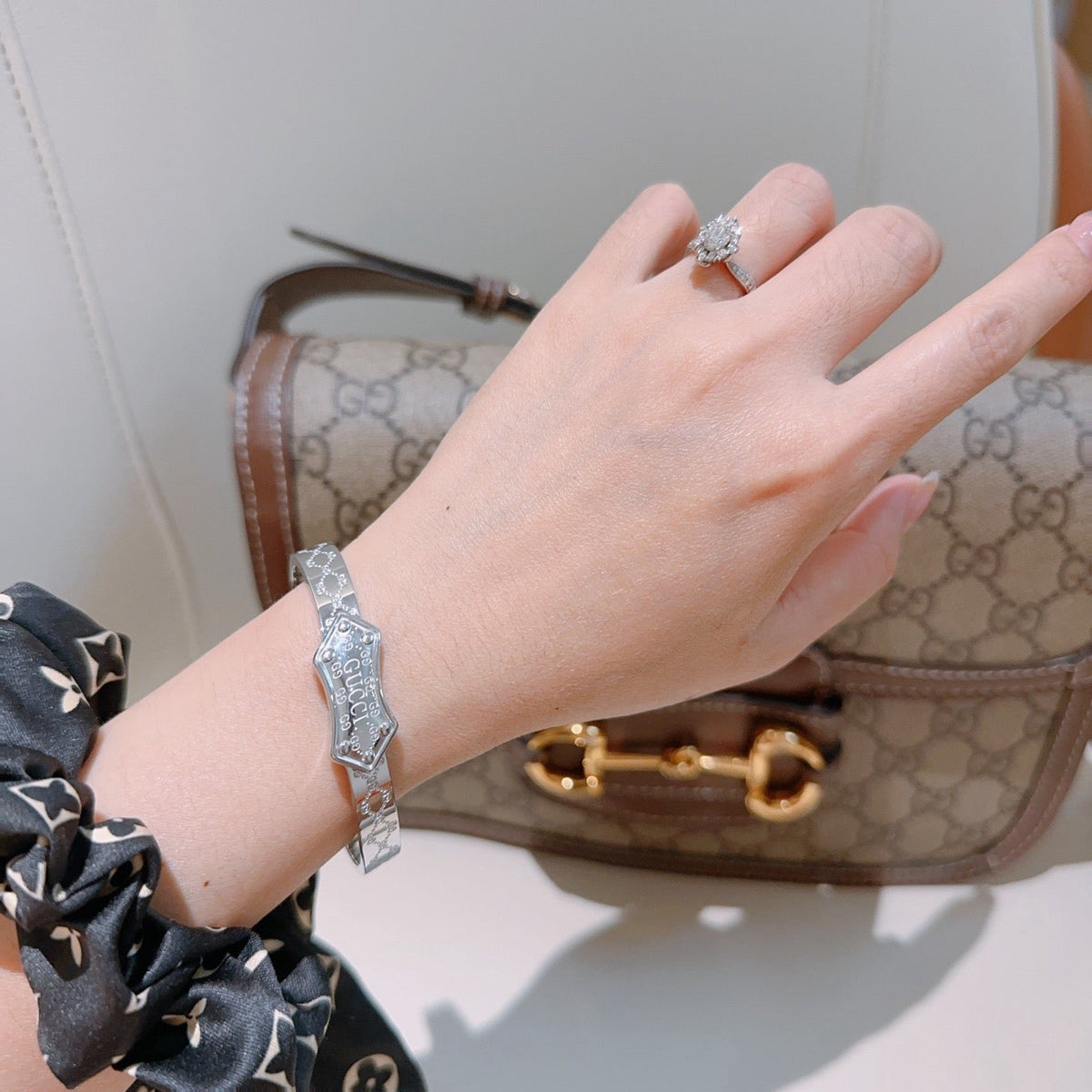 Martin Graham bangle in polished metal-tone – styled product view