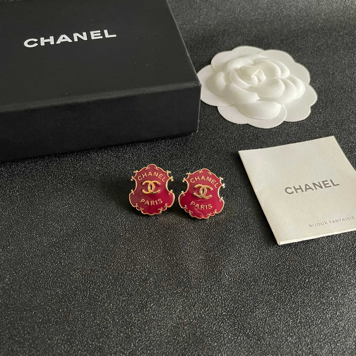 Martin Graham stud earrings in polished metal-tone – styled product view