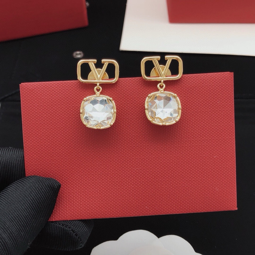 Martin Graham stud earrings in polished metal-tone
