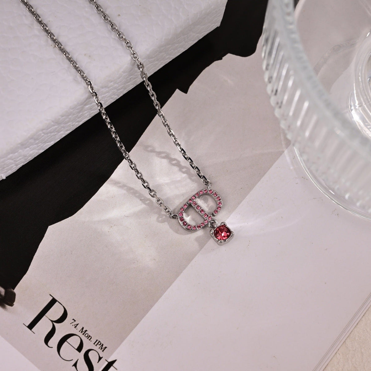 Martin Graham pendant necklace in polished metal-tone – close-up detail