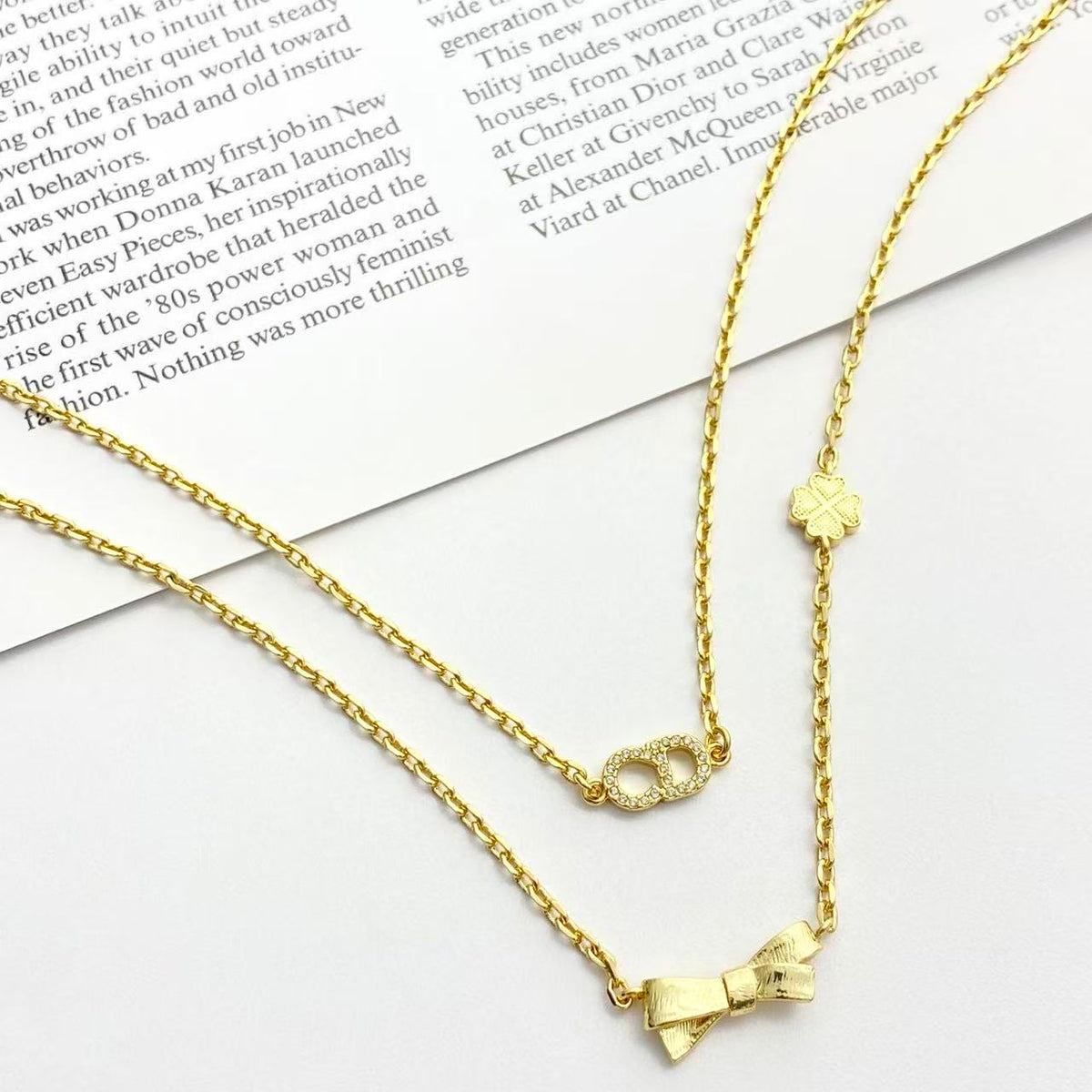 Martin Graham pendant necklace in polished metal-tone – close-up detail
