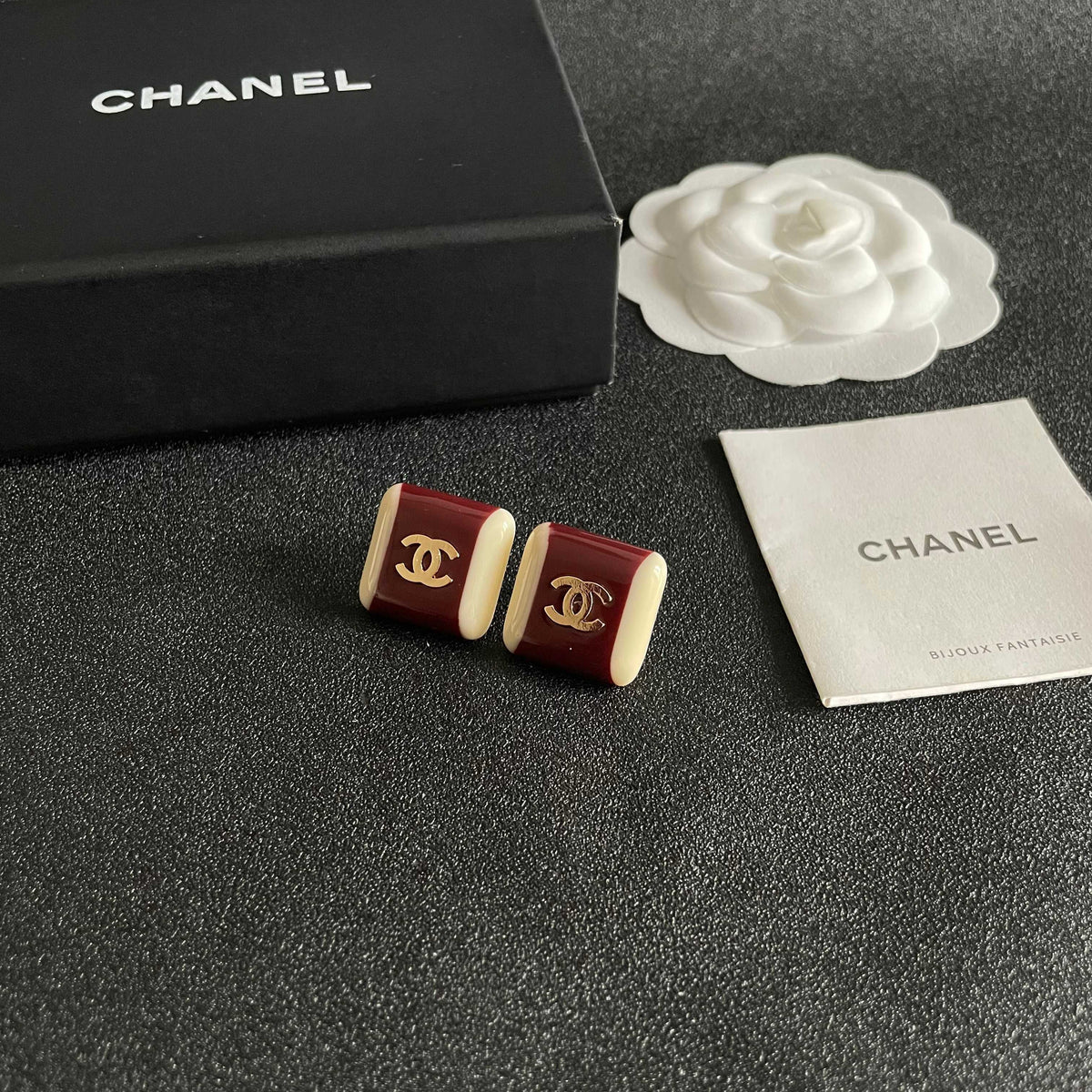 Martin Graham stud earrings in polished metal-tone – styled product view
