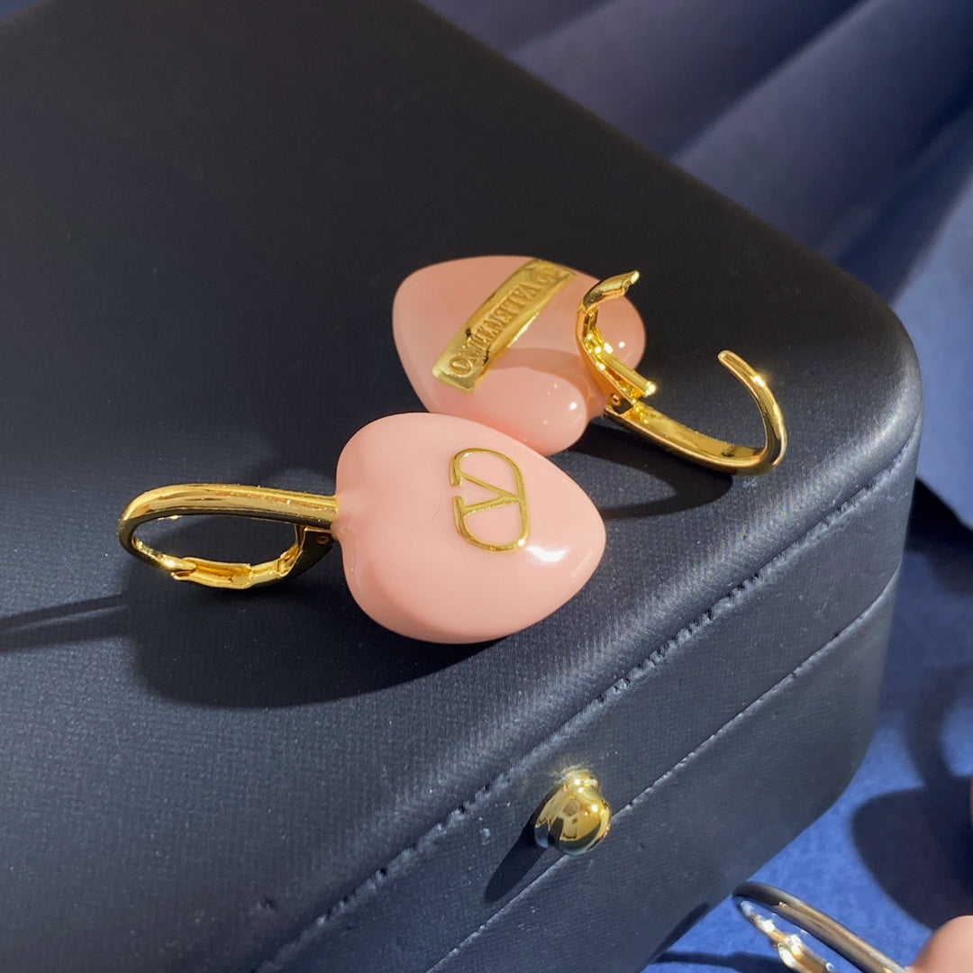 Martin Graham earrings in polished metal-tone