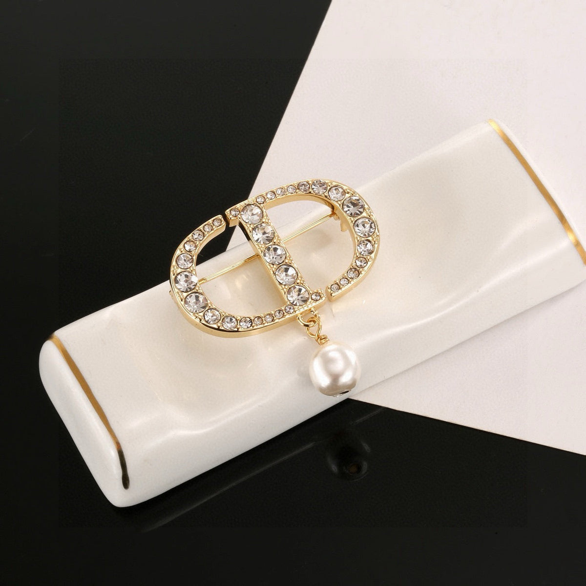Martin Graham brooch in polished metal-tone – close-up detail