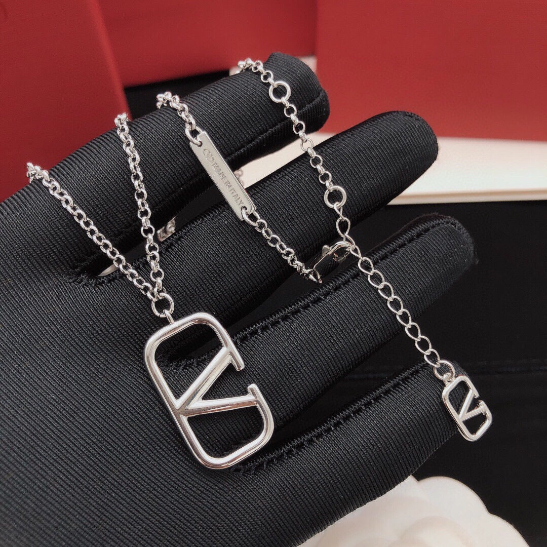 Martin Graham pendant necklace in polished metal-tone
