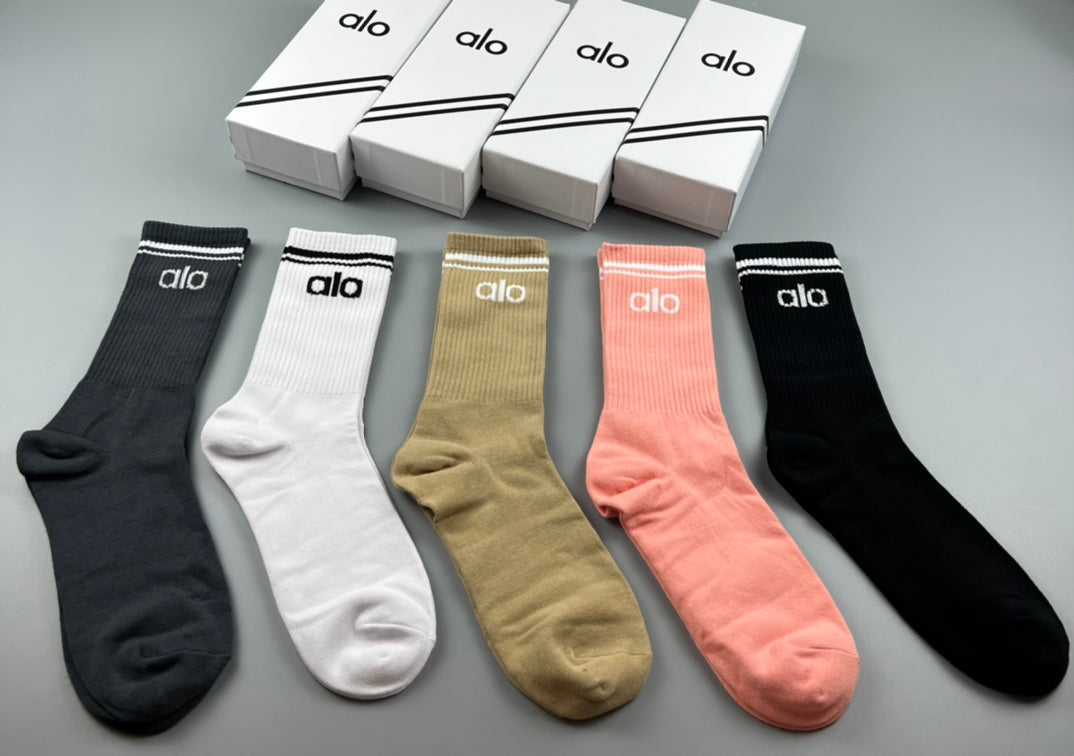 Alo cotton sports socks arranged in gray, khaki, pink, blue, black, and white