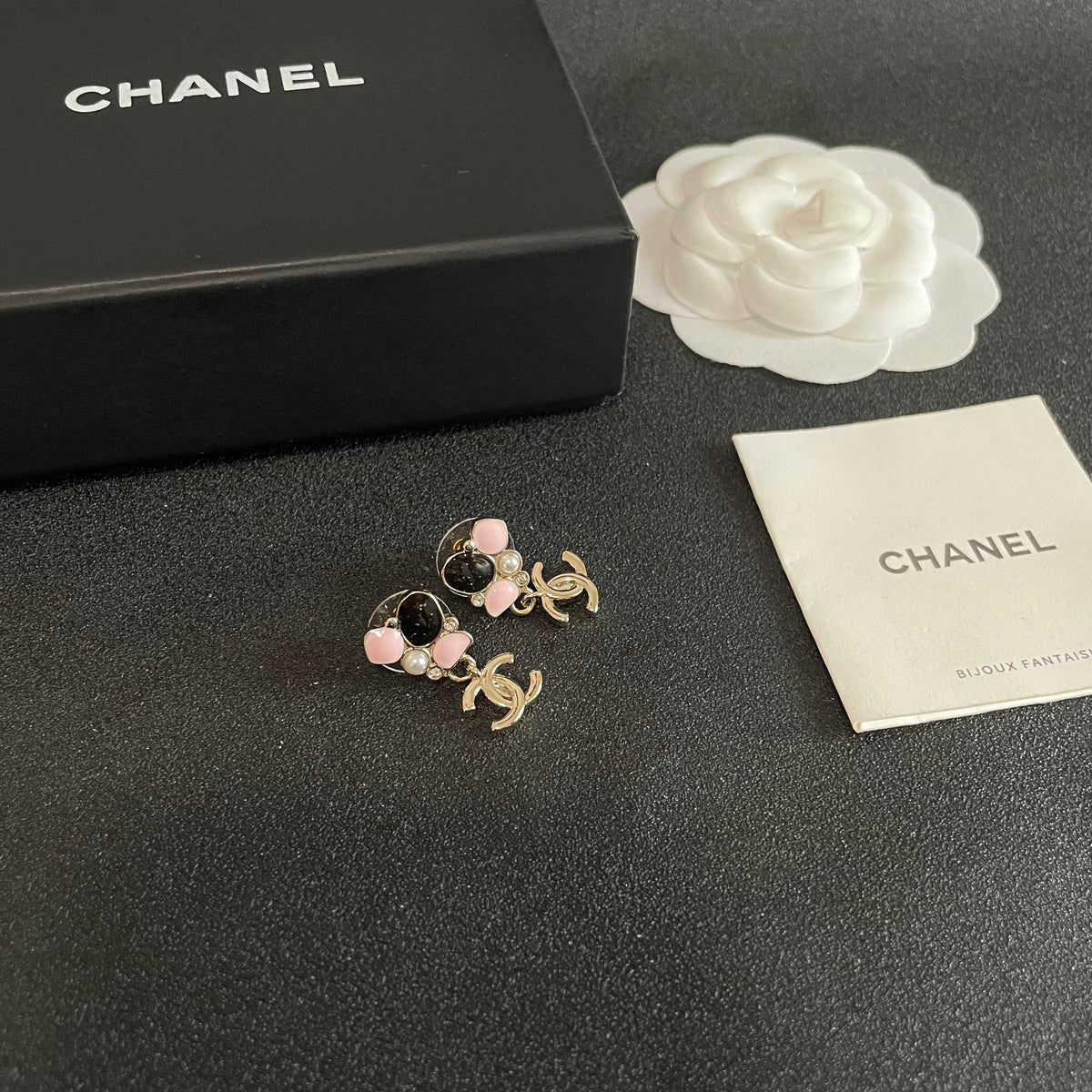Martin Graham stud earrings in polished metal-tone – styled product view