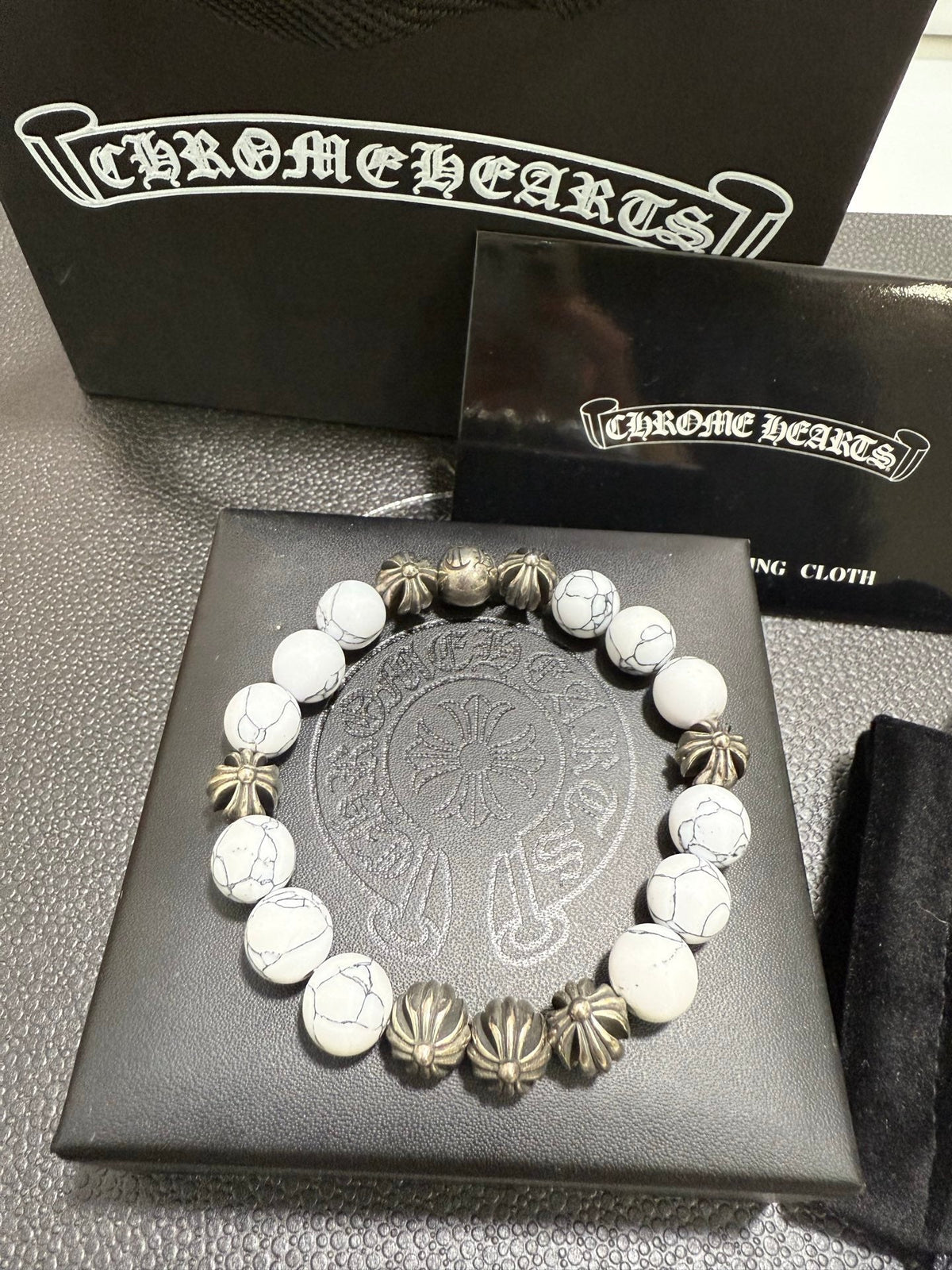 Martin Graham jewelry accessory in polished metal-tone – styled product view