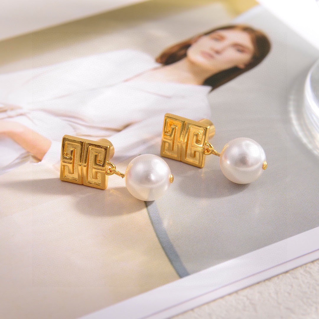 Martin Graham stud earrings in polished metal-tone