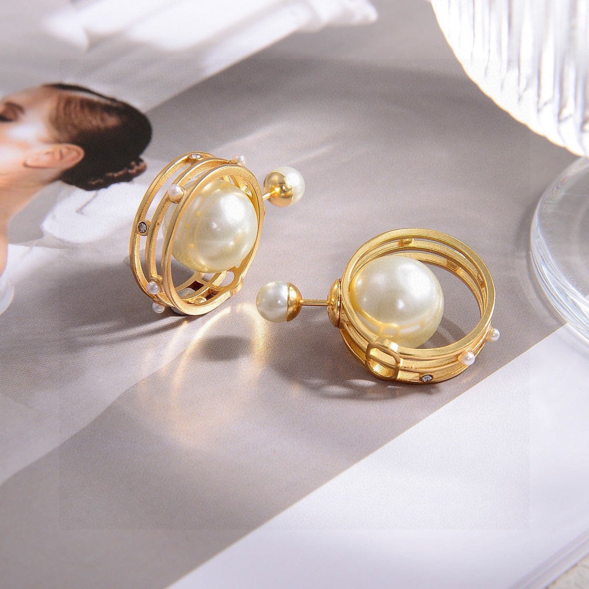Martin Graham earrings in polished metal-tone – close-up detail