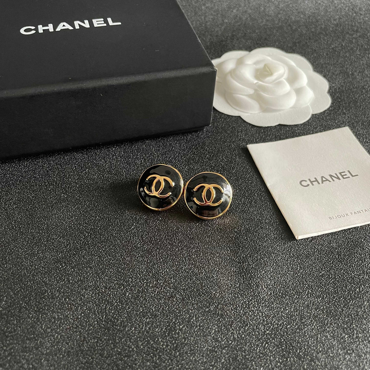 Martin Graham stud earrings in polished metal-tone – styled product view