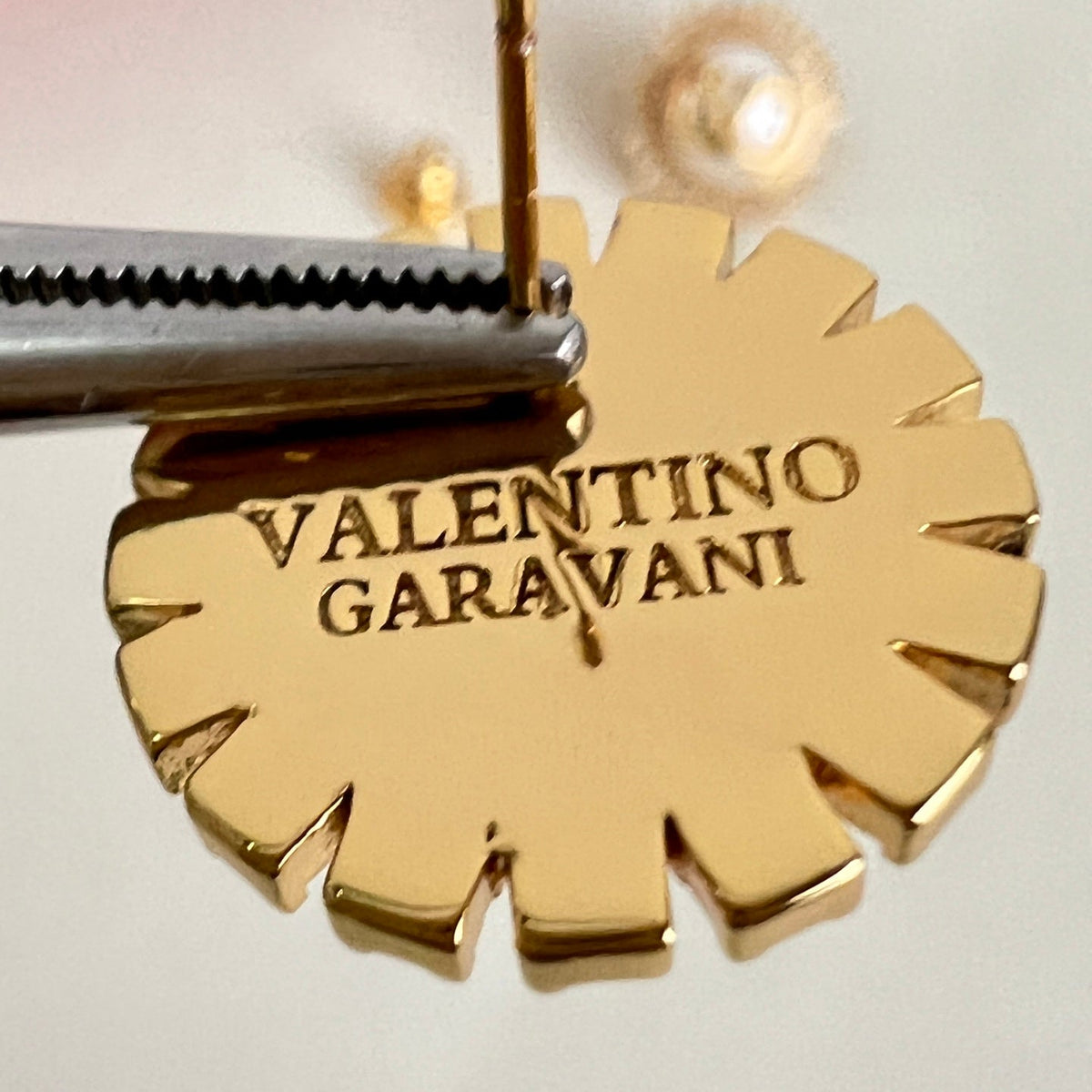 Martin Graham earrings in polished metal-tone