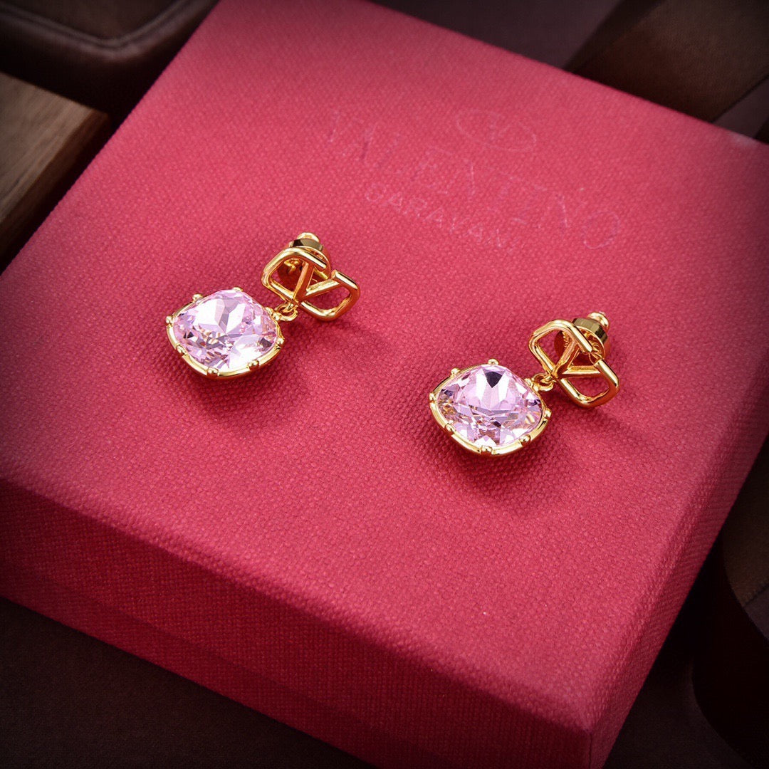 Martin Graham stud earrings in polished metal-tone