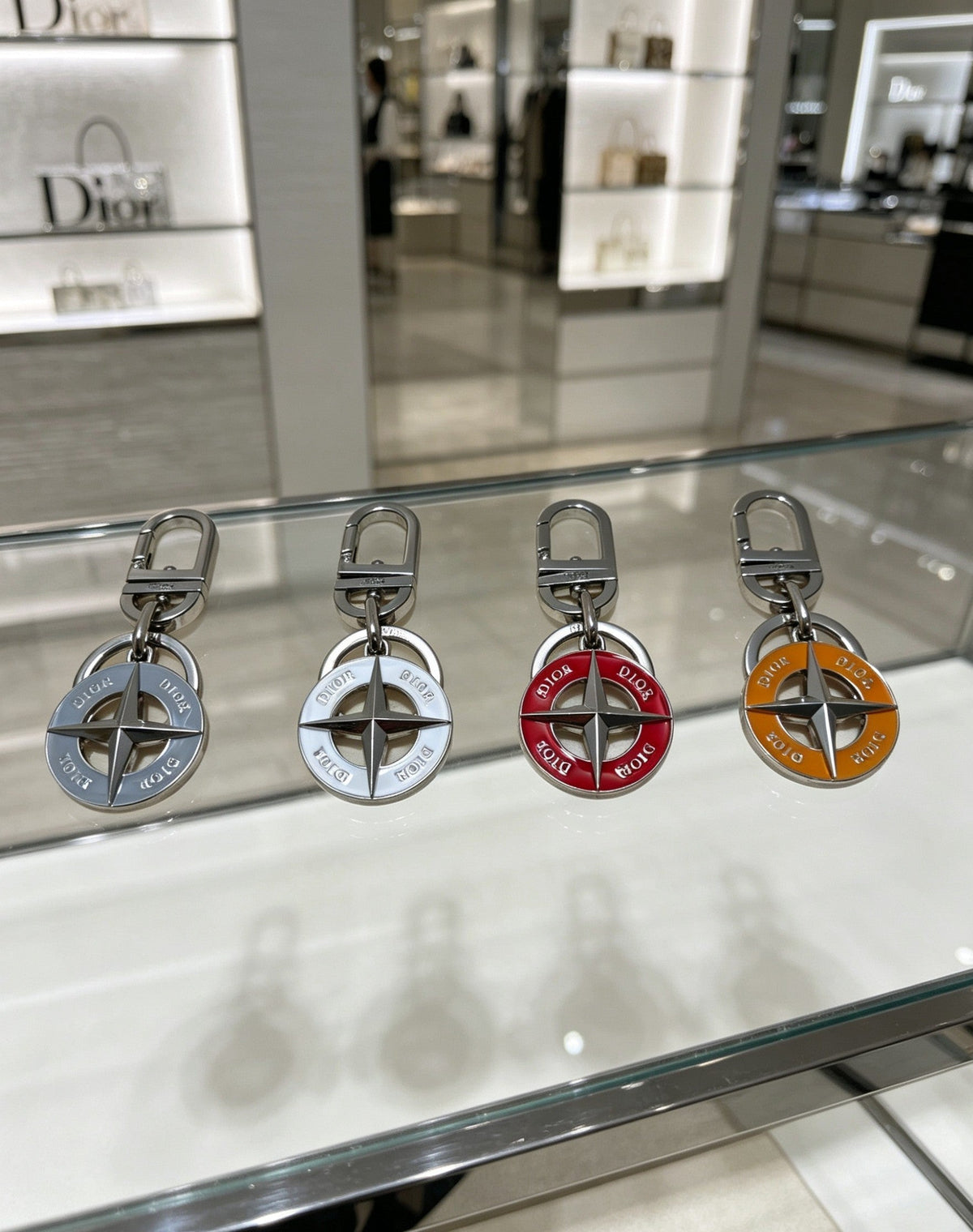 Martin Graham bag charm in polished metal-tone – close-up detail