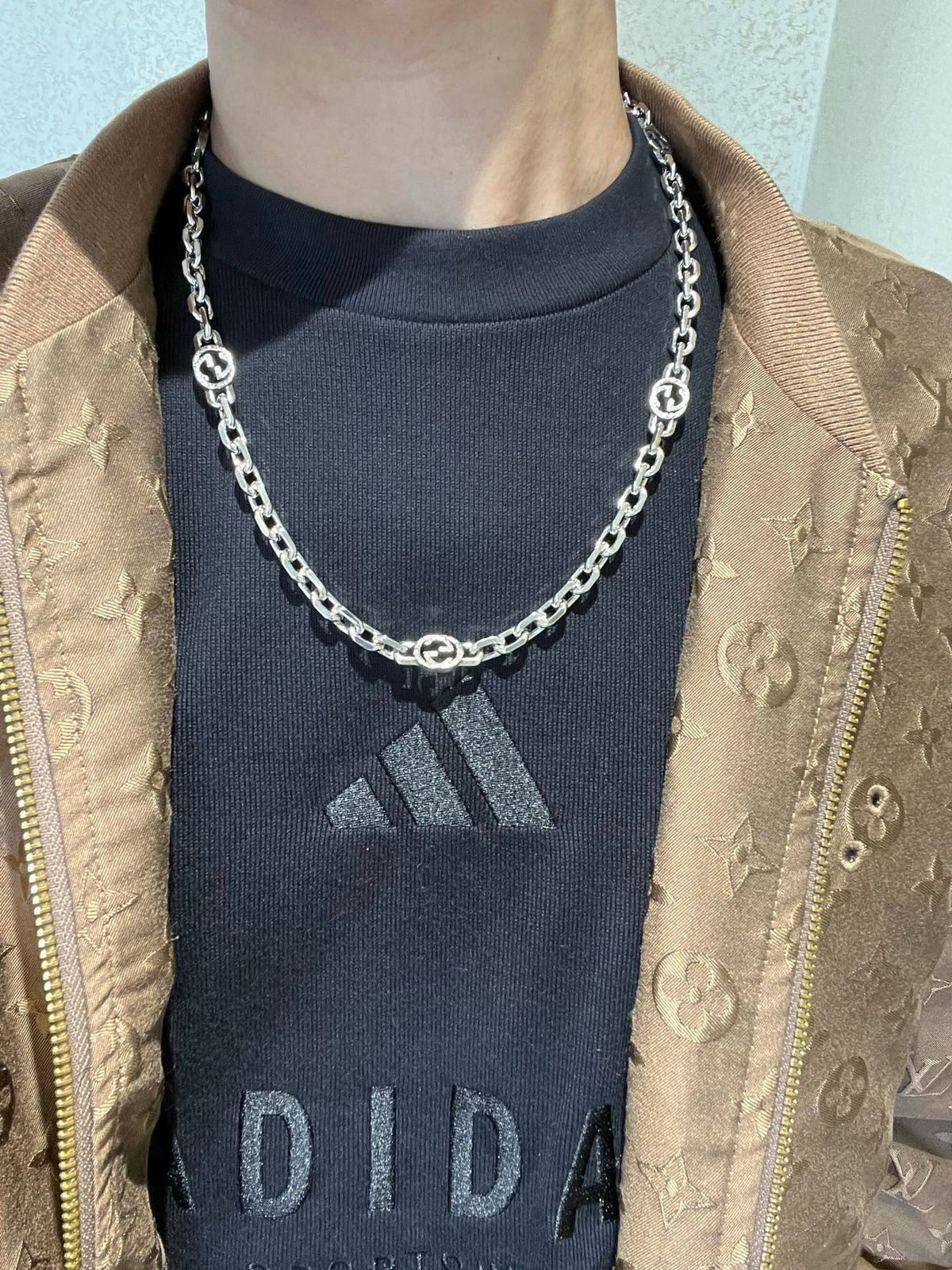 Martin Graham pendant necklace in polished metal-tone – styled product view