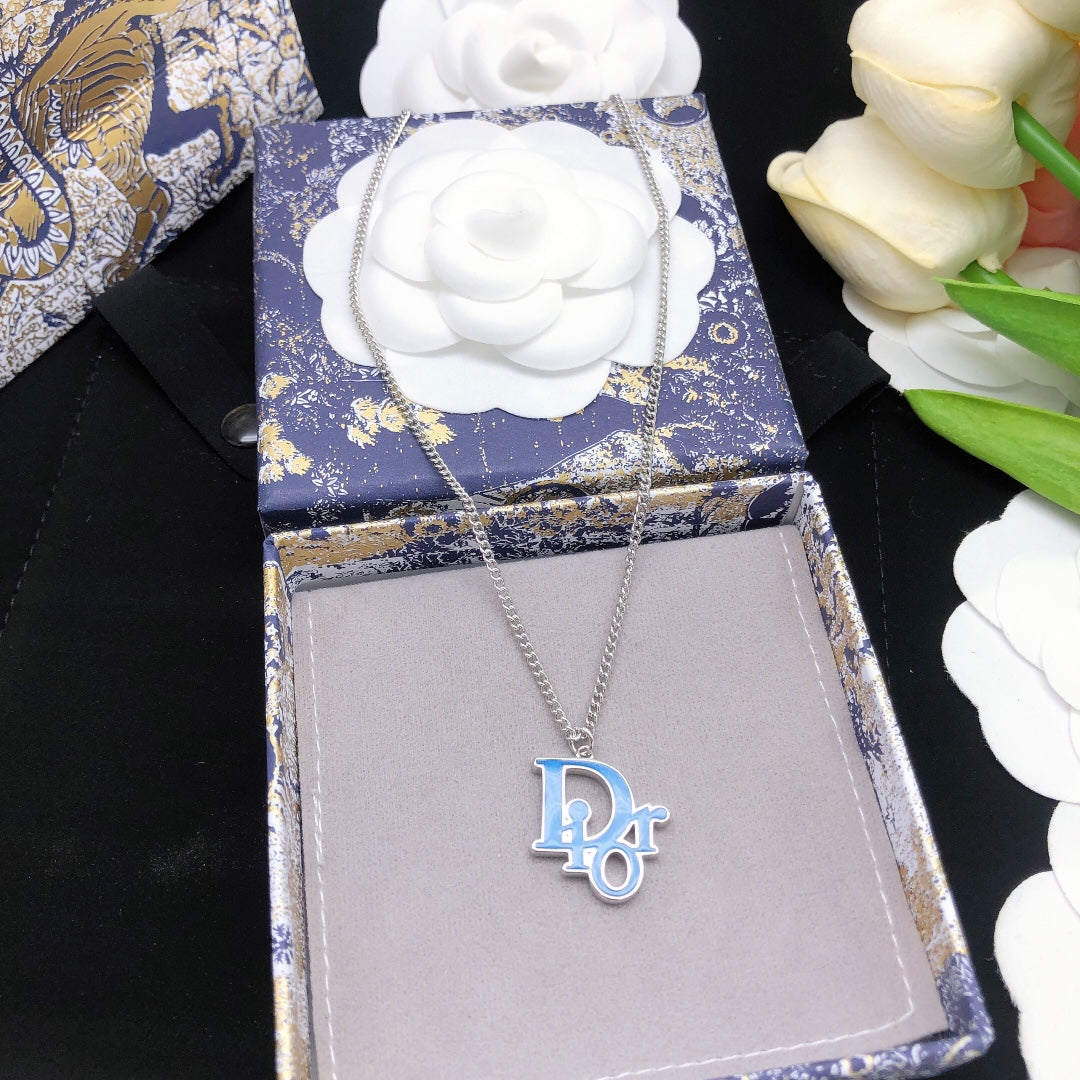 Martin Graham pendant necklace in polished metal-tone – close-up detail