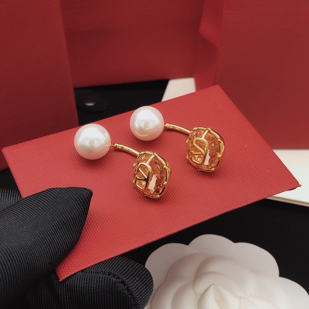 Martin Graham drop earrings in polished metal-tone