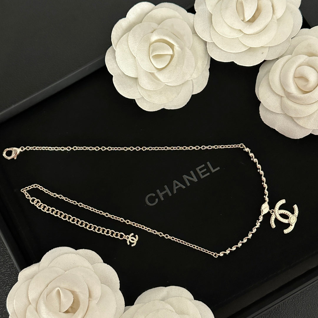 Martin Graham pendant necklace in polished metal-tone – styled product view