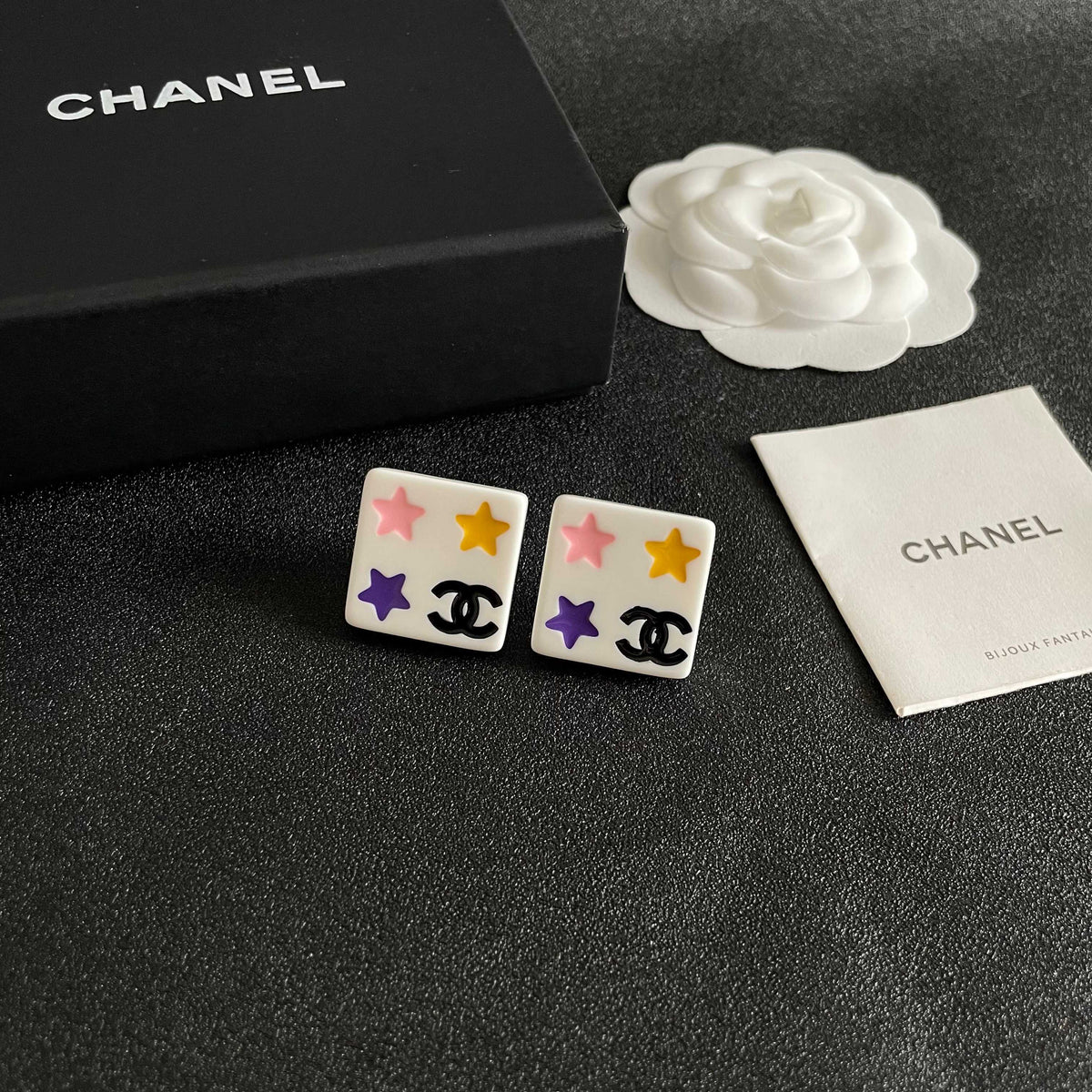 Martin Graham stud earrings in polished metal-tone – styled product view