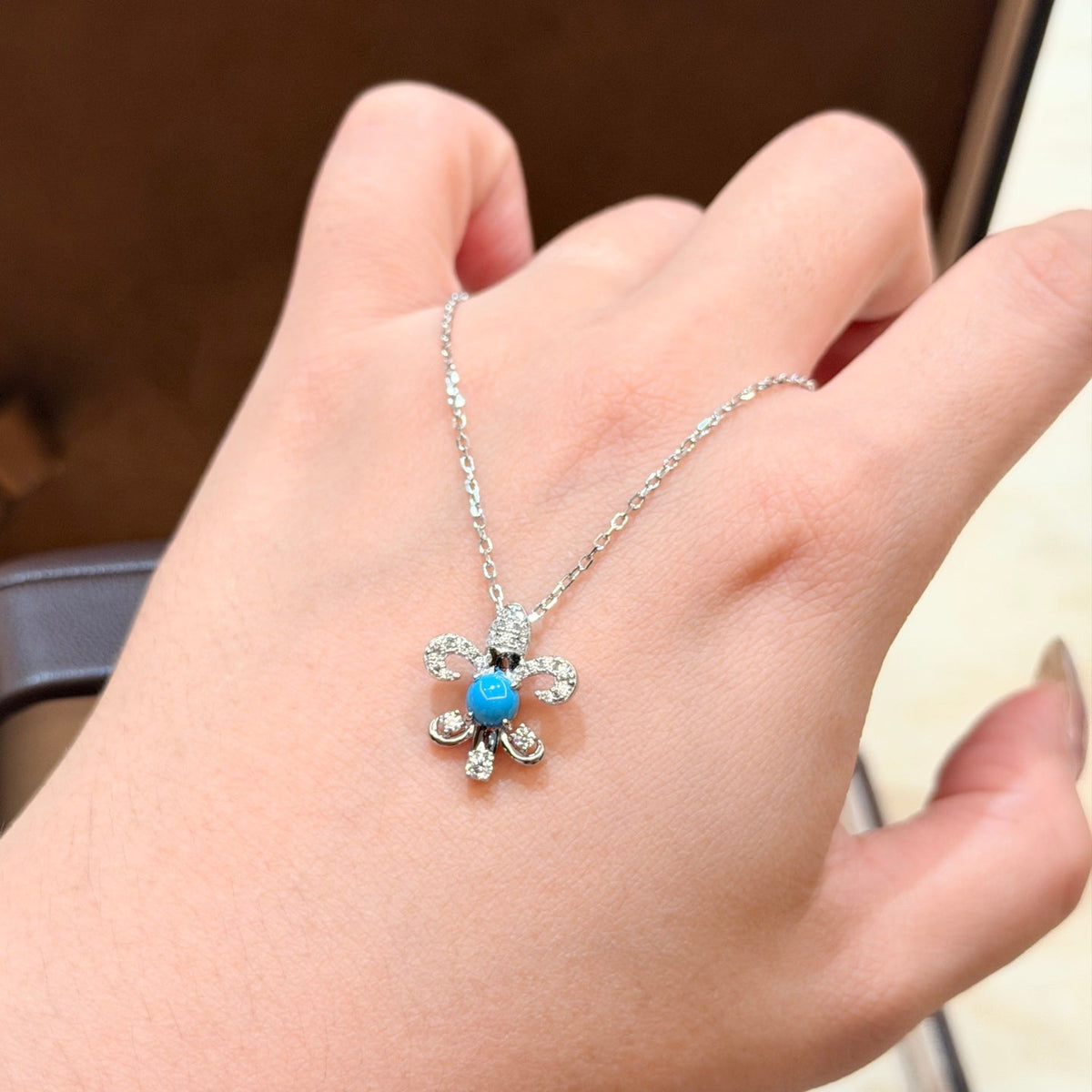 Martin Graham pendant necklace in polished metal-tone – styled product view