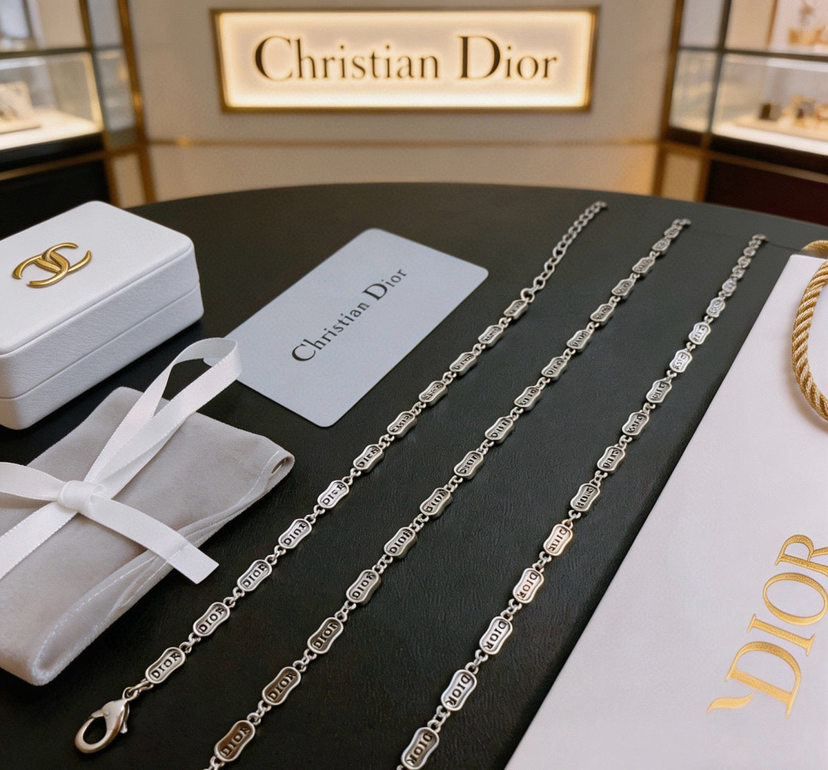 Martin Graham pendant necklace in polished metal-tone – close-up detail