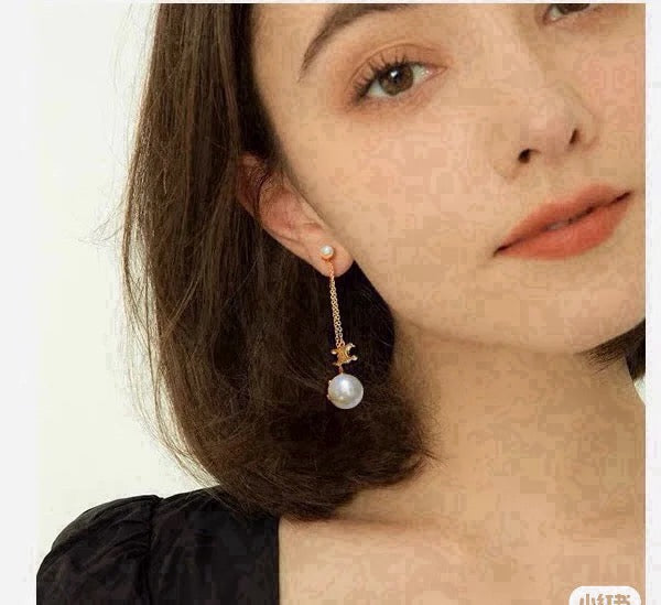 Martin Graham stud earrings in polished metal-tone
