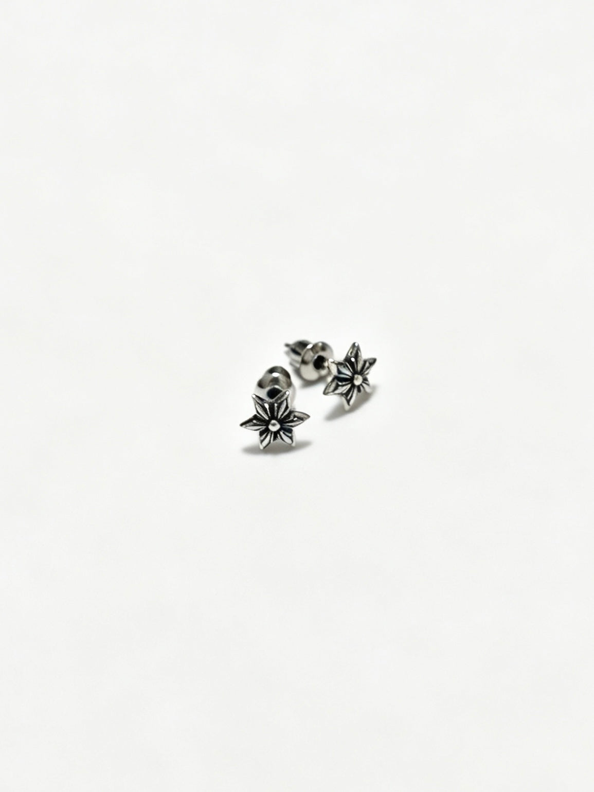 Martin Graham earrings in polished metal-tone – styled product view