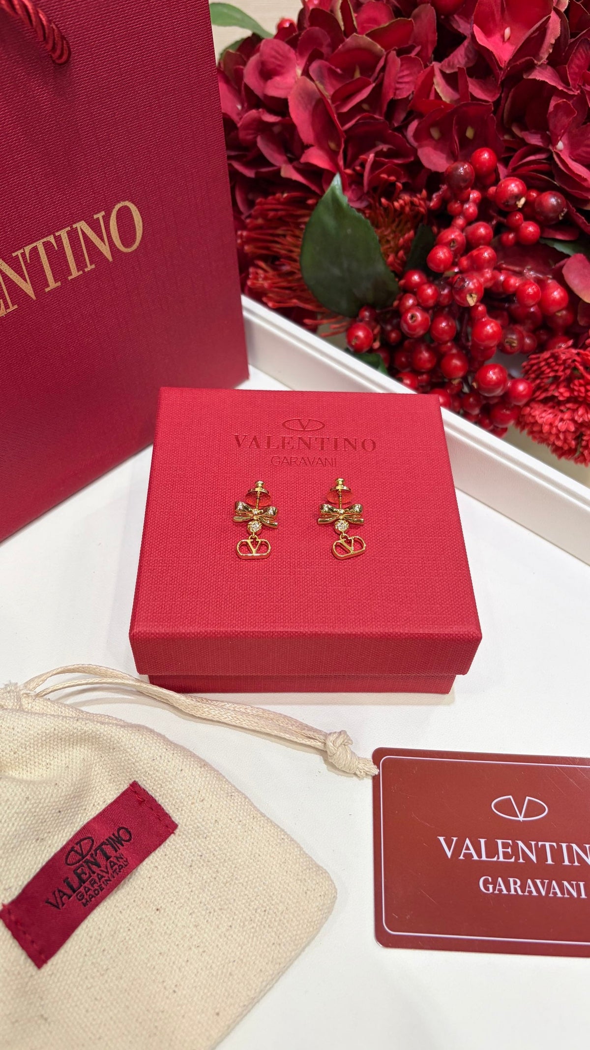 Martin Graham earrings in polished metal-tone