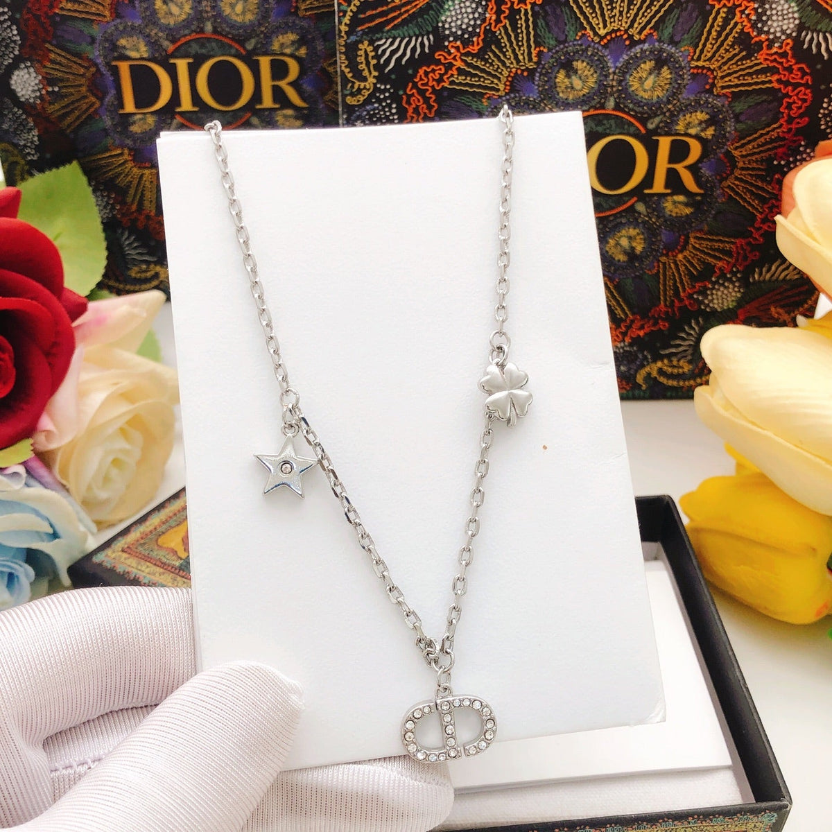 Martin Graham pendant necklace in polished metal-tone – close-up detail