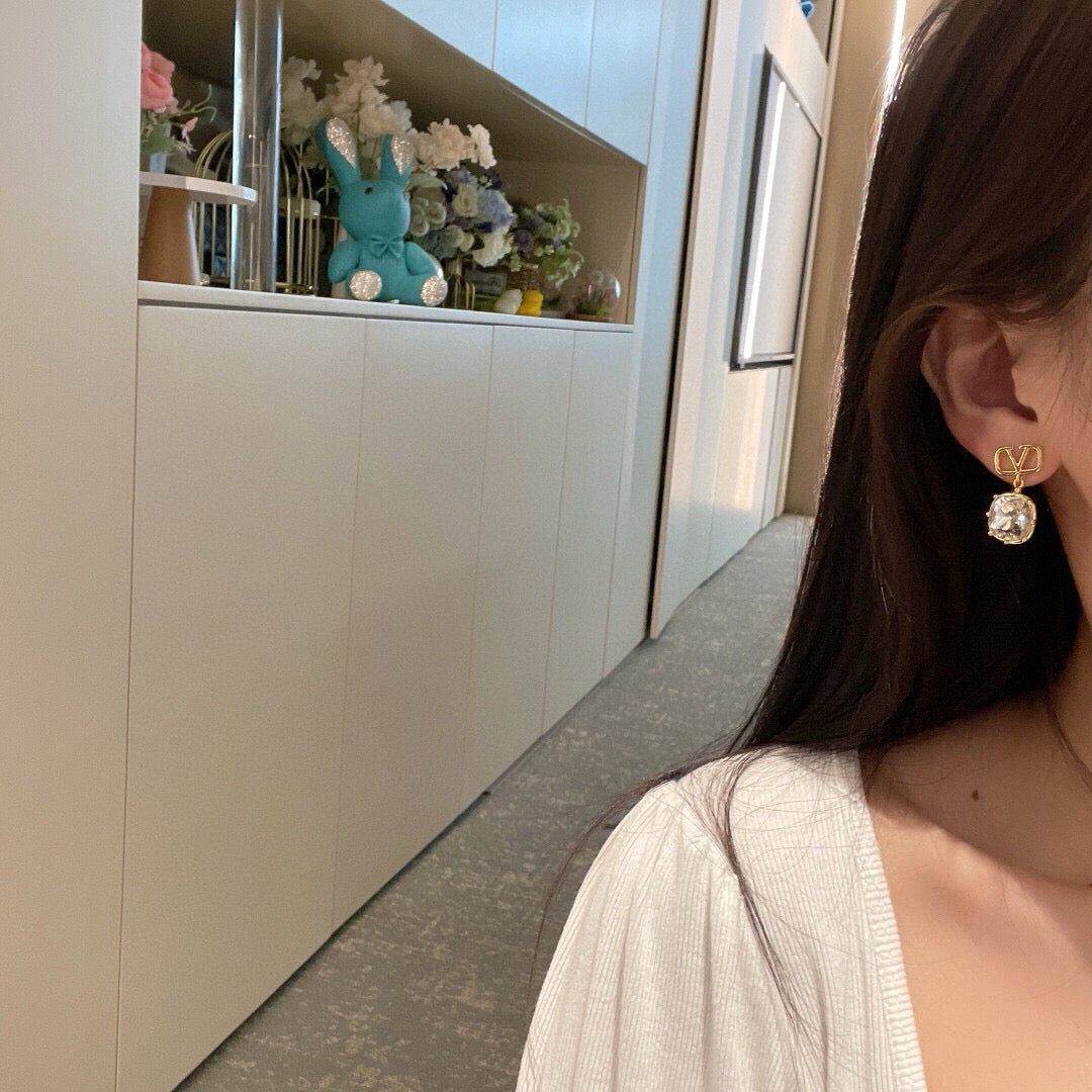 Martin Graham stud earrings in polished metal-tone – main product view