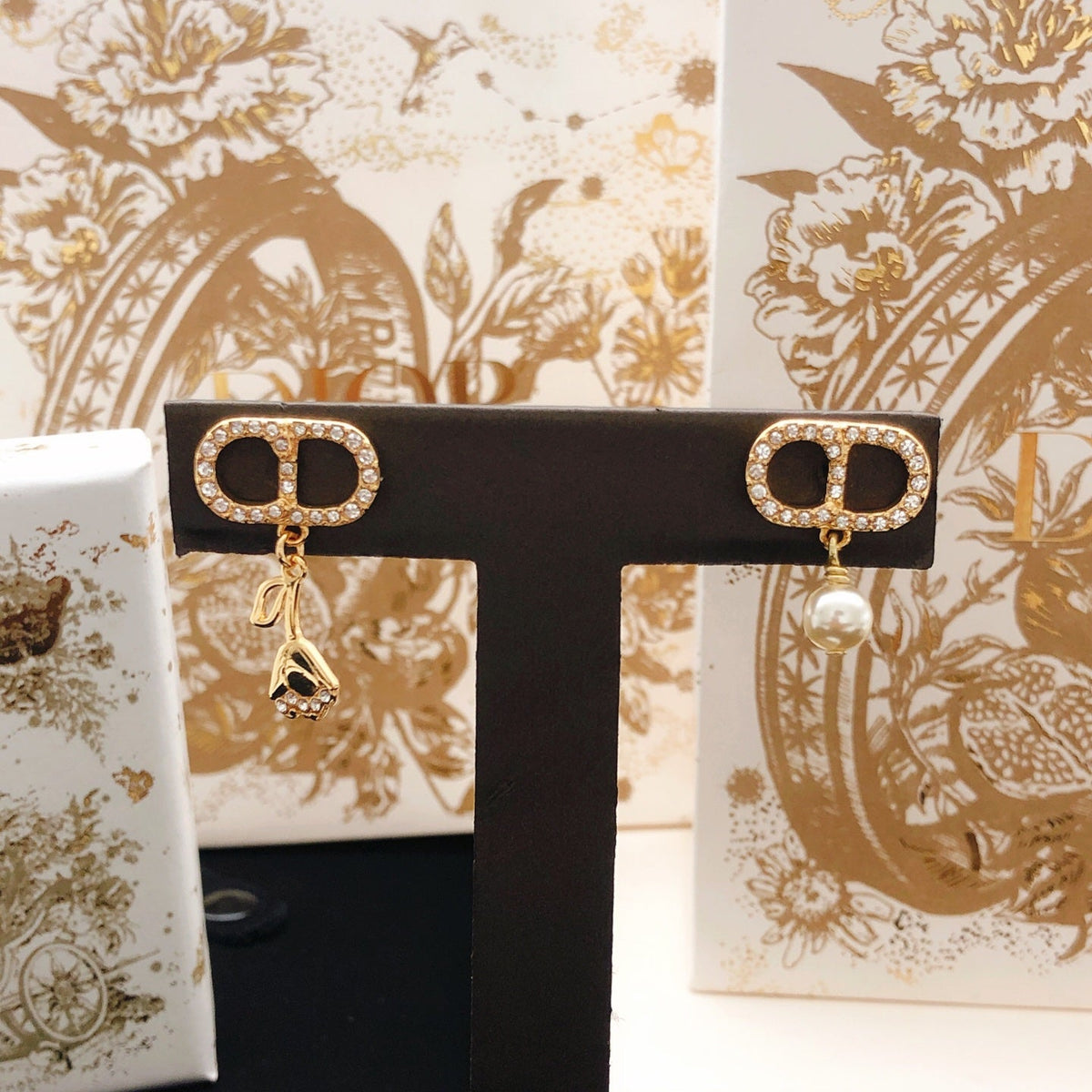 Martin Graham stud earrings in polished metal-tone – main product view