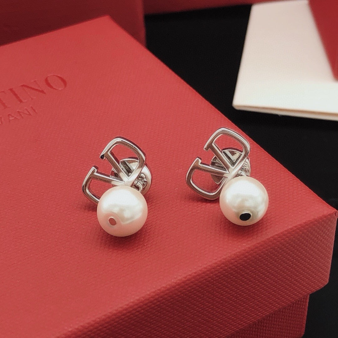 Martin Graham stud earrings in polished metal-tone – main product view