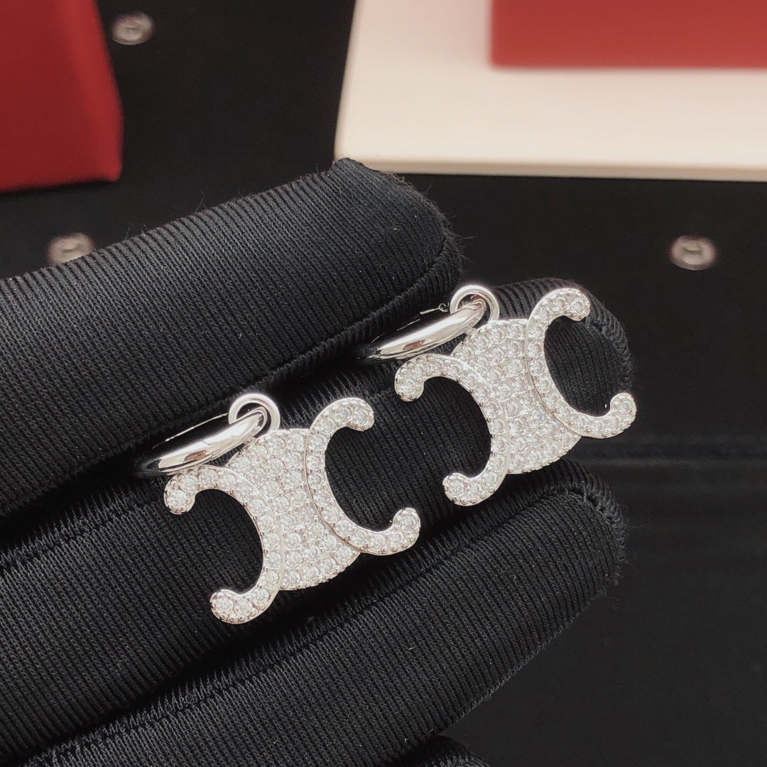 Martin Graham drop earrings in polished metal-tone – main product view