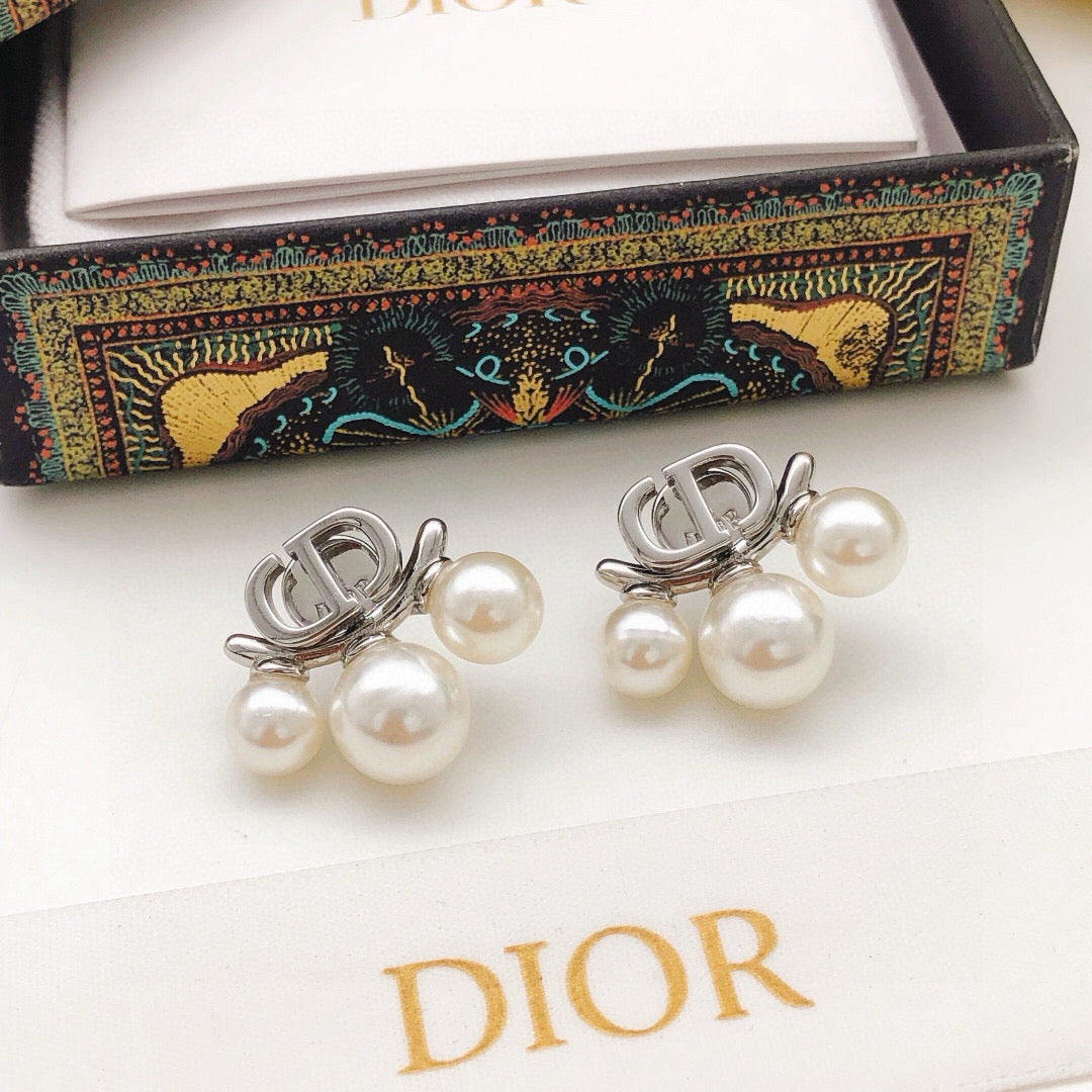 Martin Graham stud earrings in polished metal-tone – main product view