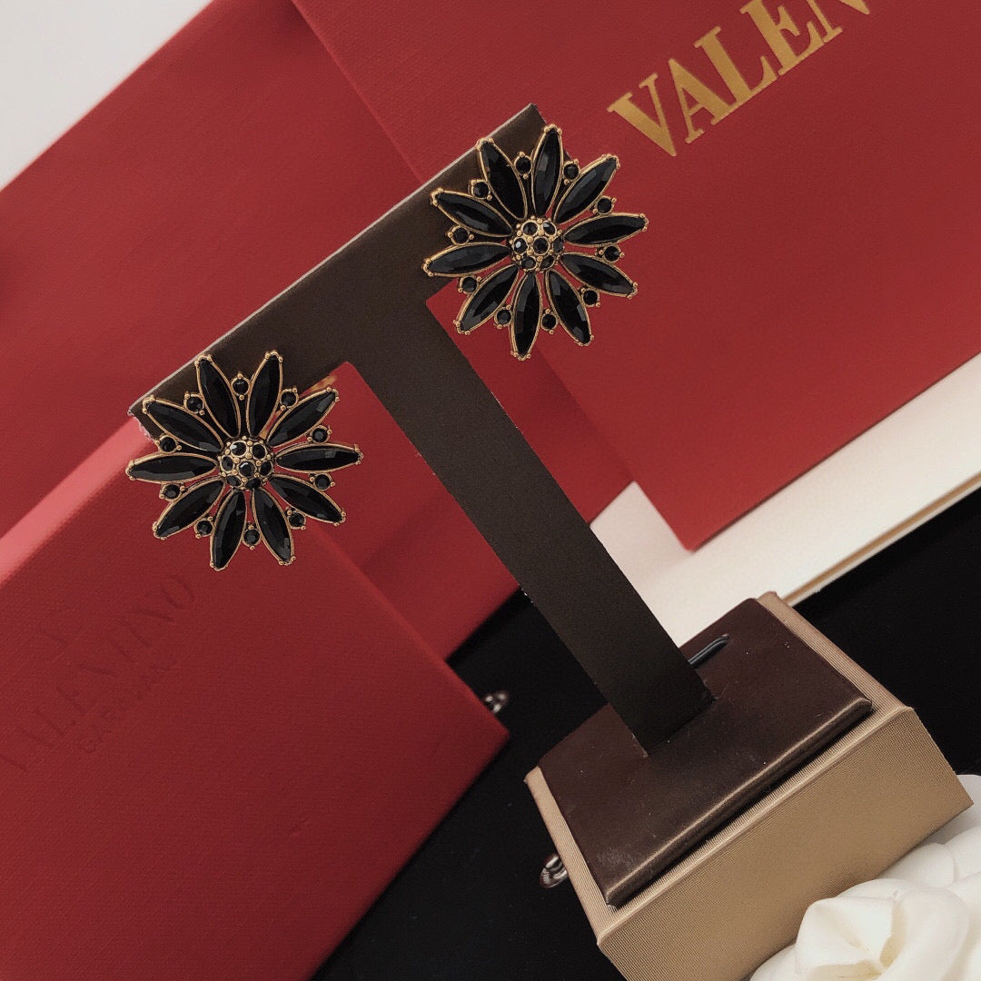 Martin Graham stud earrings in polished metal-tone – main product view