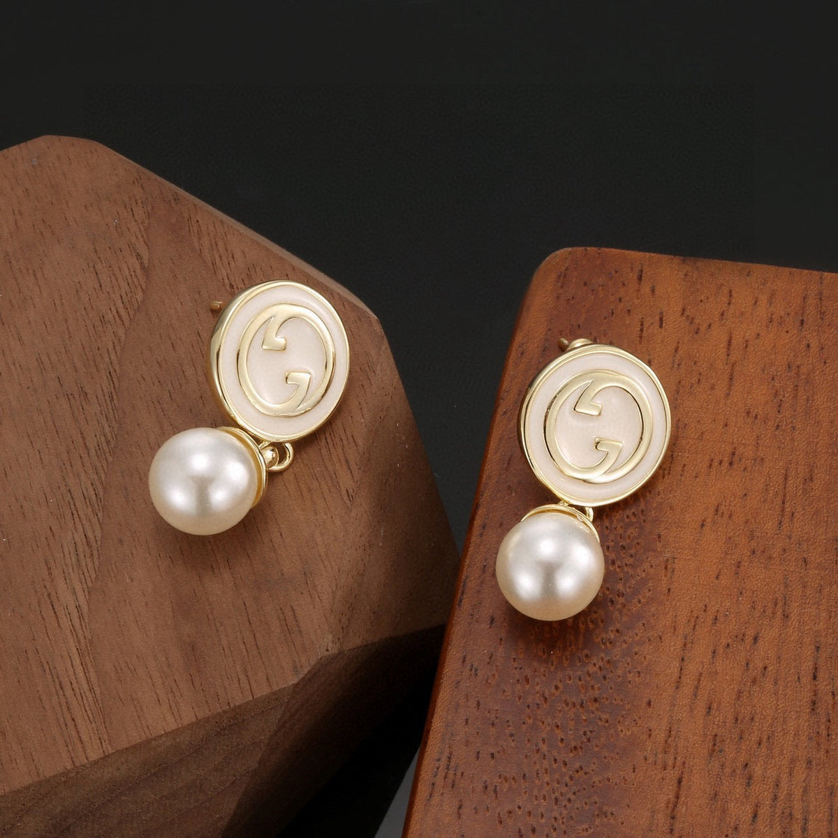 Martin Graham stud earrings in polished metal-tone – main product view