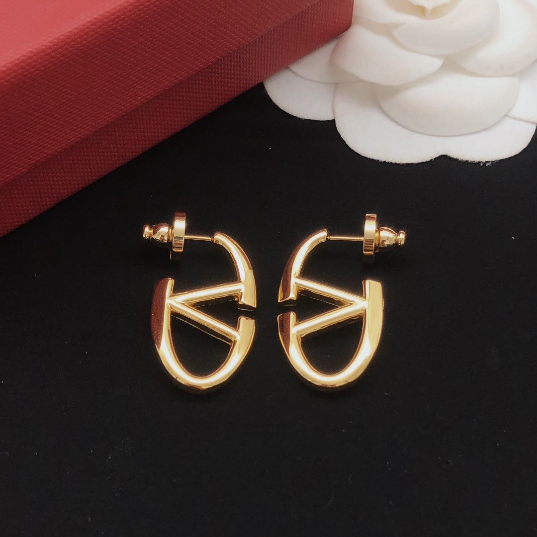 Martin Graham stud earrings in polished metal-tone – main product view