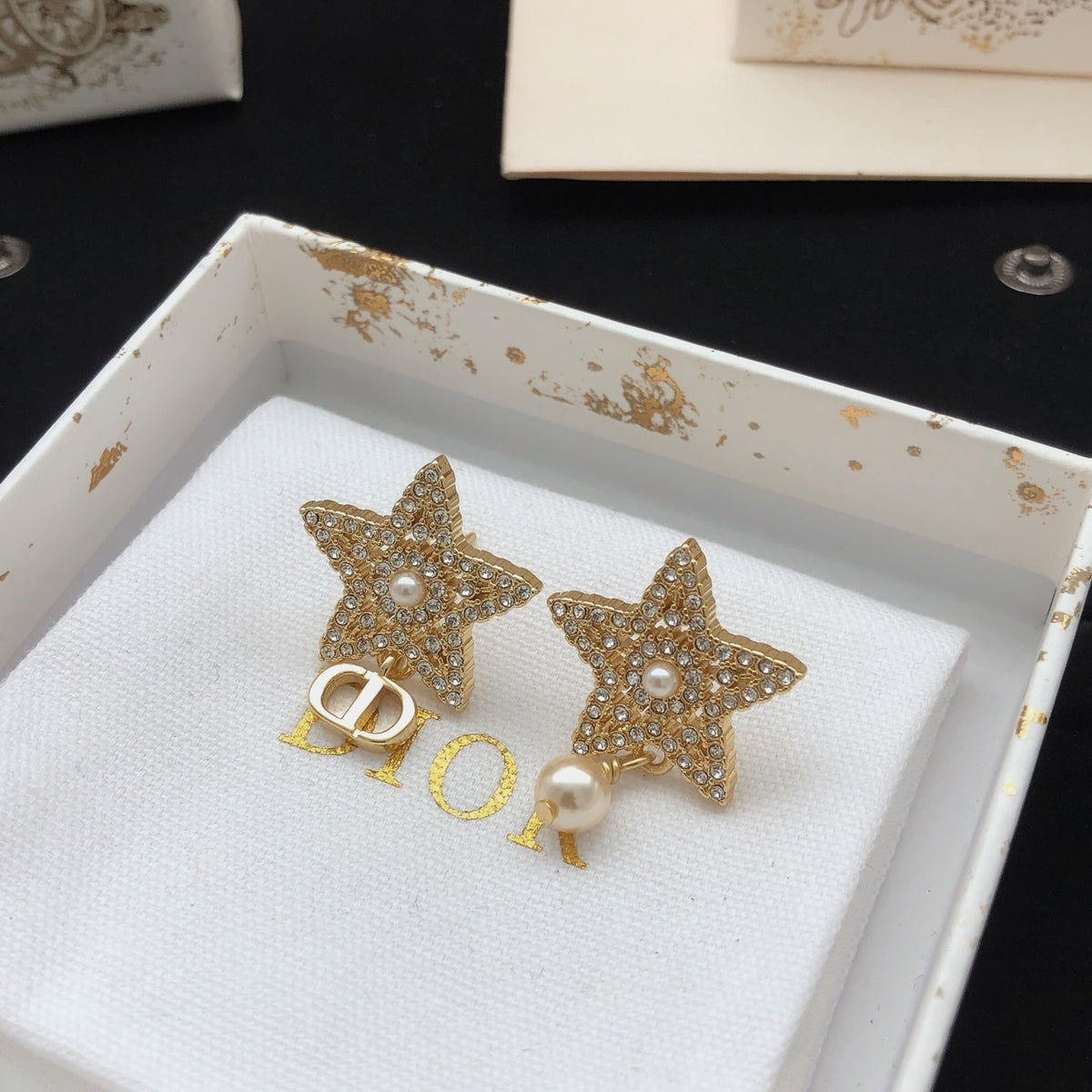 Martin Graham stud earrings in polished metal-tone – main product view