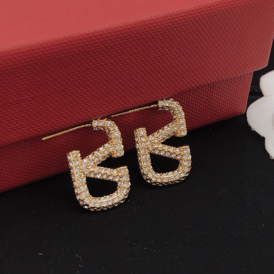 Martin Graham stud earrings in polished metal-tone – main product view